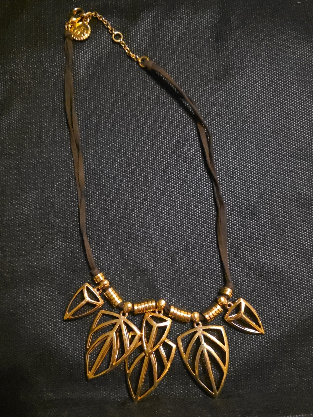 Jessica Simpson Gold Leaf Statement Necklace with Black Cord